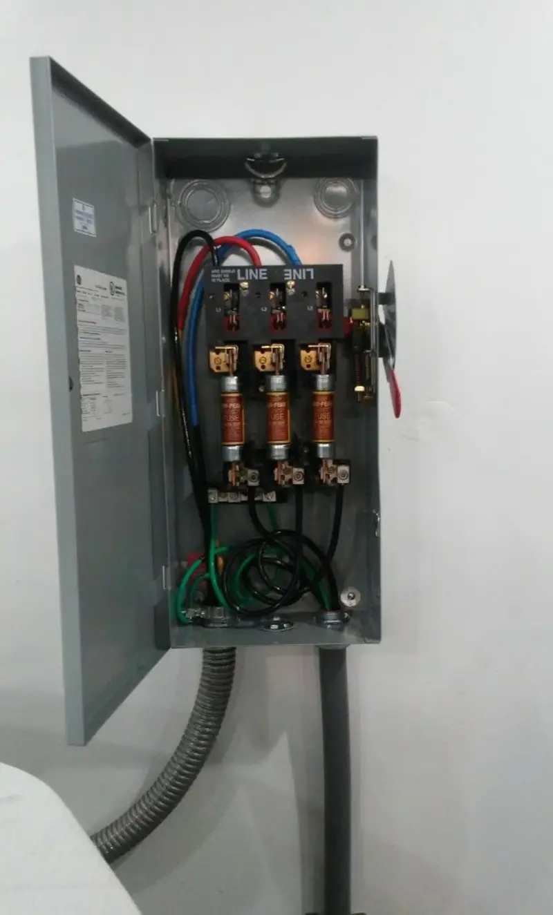 Three-phase disconnect switch installed for Smoke Detector Installation in Biscayne Park